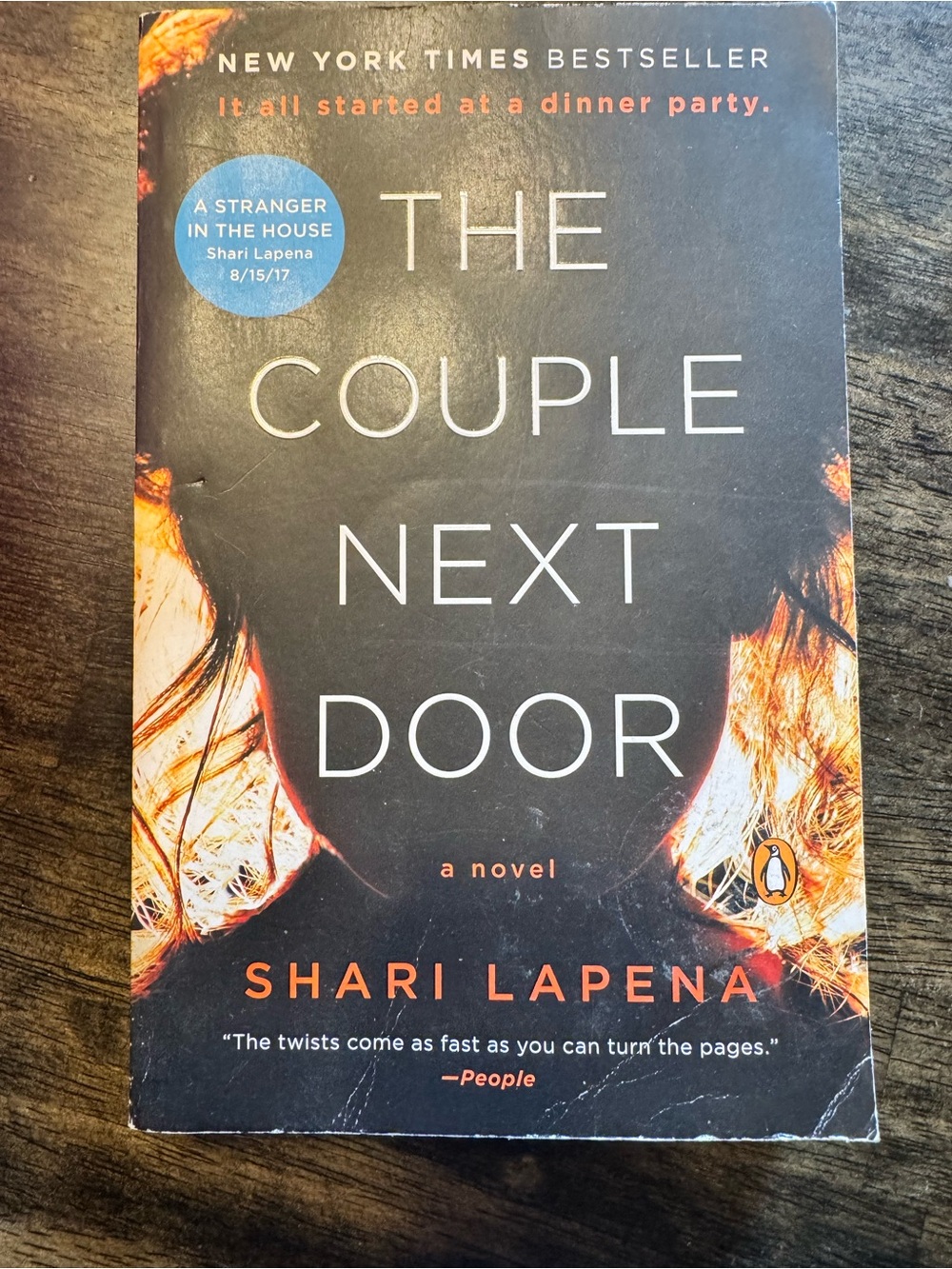The Couple Next Door - Black & Orange Paperback Novel